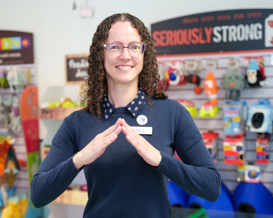 1.	Rachel Sutton, a receptionist at Rutland House Vets, is learning British Sign Language to help deaf clients. Photo: Rutland House Vets 